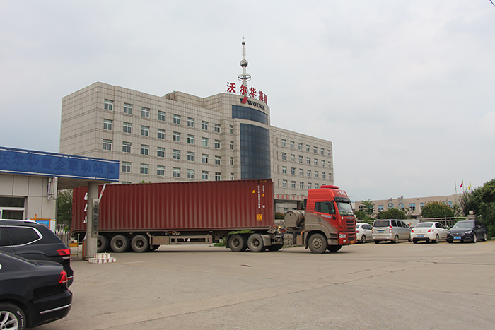 乐虎88国际集团一批新款轮式挖掘机出口东南亚